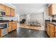 Open-concept view of the kitchen with stainless steel appliances and view of the adjacent living spaces at 2192 Bell Rd., Longs, SC 29568