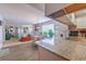 Partial view of a renovated kitchen with stainless appliances and granite countertops at 223 Maisons Dr. # A8, Myrtle Beach, SC 29572