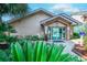 Welcoming pool entrance with lush landscaping, plants, and convenient access to the building amenities at 223 Maisons Dr. # A8, Myrtle Beach, SC 29572