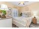 A naturally-lit bedroom features wood floors and a ceiling fan at 233 Banbury Ln. # 302, Little River, SC 29566