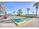 Shuffleboard court with palm trees and seating near the ocean at 2401 S Ocean Blvd. # 359, Myrtle Beach, SC 29577