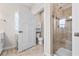 Bathroom featuring a tiled glass shower and a separate toilet room for added privacy at 2609 Turchino Ct., Myrtle Beach, SC 29579