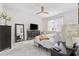 Bright bedroom featuring a ceiling fan, and a large dresser with a modern television on top at 2815 Eclipse Dr., Myrtle Beach, SC 29577