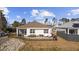 Back exterior featuring patio, screened porch, and fenced backyard at 2815 Eclipse Dr., Myrtle Beach, SC 29577