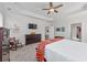 Comfortable main bedroom with tray ceiling, modern decor, and plenty of natural light creates a relaxing atmosphere at 3105 White Jasmine Dr., Little River, SC 29566