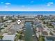 Aerial shot highlighting the waterfront community, with a canal leading to the ocean at 311 51St Ave. N, North Myrtle Beach, SC 29582