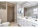 Modern bathroom featuring a stand-up shower and a double sink vanity at 311 51St Ave. N, North Myrtle Beach, SC 29582