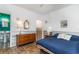 Comfortable bedroom with a double bed, a side table with a lamp, and a dresser at 311 51St Ave. N, North Myrtle Beach, SC 29582