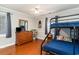 Cozy bedroom featuring a bunk bed, dresser, and a ceiling fan for comfortable living at 311 51St Ave. N, North Myrtle Beach, SC 29582