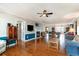 Bright and spacious living room with hardwood floors, a fireplace, and plenty of natural light at 311 51St Ave. N, North Myrtle Beach, SC 29582