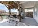 Outdoor bar area with seating, perfect for entertaining and enjoying the waterfront views at 311 51St Ave. N, North Myrtle Beach, SC 29582