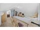 Attic bedroom featuring a desk and chair set, neutral walls, and a view into a bathroom at 357 Cabo Loop, Myrtle Beach, SC 29588