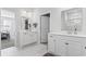 Bright bathroom boasts double vanities, neutral walls, and marble floors at 360 Cattle Drive Circle, Myrtle Beach, SC 29588