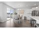 Open dining area with patio doors and modern furnishings at 360 Cattle Drive Circle, Myrtle Beach, SC 29588