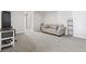 Cozy living room featuring neutral walls, light-colored carpet, and a beige sofa at 360 Cattle Drive Circle, Myrtle Beach, SC 29588