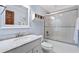 Well-lit bathroom featuring a marble vanity, shower-tub combination, and modern fixtures at 404 72Nd Ave. N # 203, Myrtle Beach, SC 29572