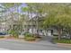 Charming Spinnakers Reach condo complex with lush landscaping and well-maintained grounds at 404 72Nd Ave. N # 203, Myrtle Beach, SC 29572