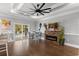 Open dining area with stone fireplace and access to the backyard pool at 405 Palo Verde Dr., Myrtle Beach, SC 29579