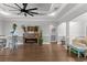 Open dining area with stone fireplace and hardwood floors at 405 Palo Verde Dr., Myrtle Beach, SC 29579