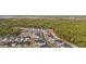 An aerial view of homes surrounded by trees, highlighting community layout and proximity to nature at 4092 Bayhill St., Myrtle Beach, SC 29579