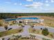 Aerial view of community with swimming pool, playground, and lush landscaping at 4092 Bayhill St., Myrtle Beach, SC 29579