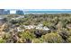 An aerial view of a charming condo building surrounded by lush greenery and mature trees at 415 Ocean Creek Dr. # 2359, Myrtle Beach, SC 29572