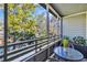 Relaxing screened balcony provides a semi-outdoor seating area and scenic views at 415 Ocean Creek Dr. # 2359, Myrtle Beach, SC 29572