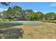 Well-maintained putting green surrounded by lush trees, offering a tranquil recreational space at 415 Ocean Creek Dr. # 2359, Myrtle Beach, SC 29572