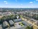 Aerial view shows the layout of the condo in a suburban neighborhood at 4150 Horseshoe Rd. # 33, Little River, SC 29566