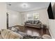 Inviting living room with hardwood floors and natural light at 4150 Horseshoe Rd. # 33, Little River, SC 29566