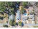 An aerial shot showcasing the property, neighboring houses, and the street layout at 4244 Luck Ave., Little River, SC 29566