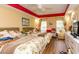 Relaxing bedroom with two beds, a ceiling fan, bright windows, and neutral colors at 4244 Luck Ave., Little River, SC 29566