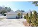 Charming single-story home featuring a two-car garage and well-maintained landscaping on a sunny day at 4244 Luck Ave., Little River, SC 29566