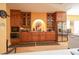 Functional kitchen with wooden cabinetry, stainless steel appliances, and ample countertop space at 4244 Luck Ave., Little River, SC 29566