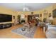 Inviting living room boasting hardwood floors, ceiling fan, and an open layout perfect for entertaining at 4244 Luck Ave., Little River, SC 29566