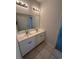 Bathroom featuring double sinks, tile floor, and walk-in shower at 4340 Grande Harbour Blvd., Little River, SC 29566