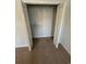 A walk-in closet with shelving and neutral carpet offers efficient storage space at 4340 Grande Harbour Blvd., Little River, SC 29566