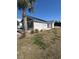 The exterior features a dark blue roof and manicured lawn at 4340 Grande Harbour Blvd., Little River, SC 29566