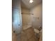 Bathroom featuring walk-in shower, toilet, and towel rack at 4340 Grande Harbour Blvd., Little River, SC 29566