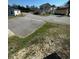 Street view of the homes in the community with grass and trees at 4340 Grande Harbour Blvd., Little River, SC 29566