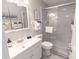 Bright bathroom with a glass enclosed shower and plenty of storage at 4406 N Ocean Blvd. # B-2, North Myrtle Beach, SC 29582