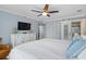 Relaxing main bedroom with a king bed, cool color palette, and 'Relax' wall decor at 4601 N Ocean Blvd. # 203, North Myrtle Beach, SC 29582