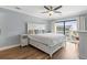 Relaxing main bedroom with a king bed, ceiling fan, and balcony access at 4601 N Ocean Blvd. # 203, North Myrtle Beach, SC 29582