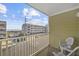 Balcony view featuring the road, nearby buildings, and ocean in the distance at 4801 N Ocean Blvd. # 3E, North Myrtle Beach, SC 29582