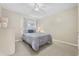 Cozy bedroom featuring neutral tones, carpeted floor, and ceiling fan at 4801 N Ocean Blvd. # 3E, North Myrtle Beach, SC 29582