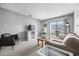 Inviting living room showcasing a sofa, coffee table, and sliding glass doors leading to a balcony at 4801 N Ocean Blvd. # 3E, North Myrtle Beach, SC 29582