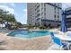 Outdoor pool area with tables and chairs, perfect for relaxation and fun at 5308 N Ocean Blvd. # 714, Myrtle Beach, SC 29577