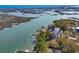 Expansive aerial view of a waterfront home with marsh views and a private boat dock at 534 South Creekside Dr., Murrells Inlet, SC 29576