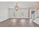 Elegant dining room with modern light fixture and a view of the front yard at 534 South Creekside Dr., Murrells Inlet, SC 29576