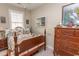 Comfortable bedroom featuring a wood bed frame, dresser, and ample natural light at 537 Botany Loop # 537, Murrells Inlet, SC 29576